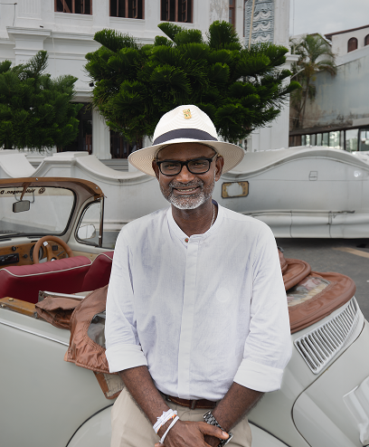 TFG host beside a classic car in Colombo